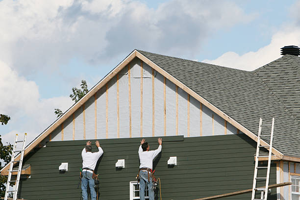 Professional Siding Replacement technician working in Marlboro, NJ
